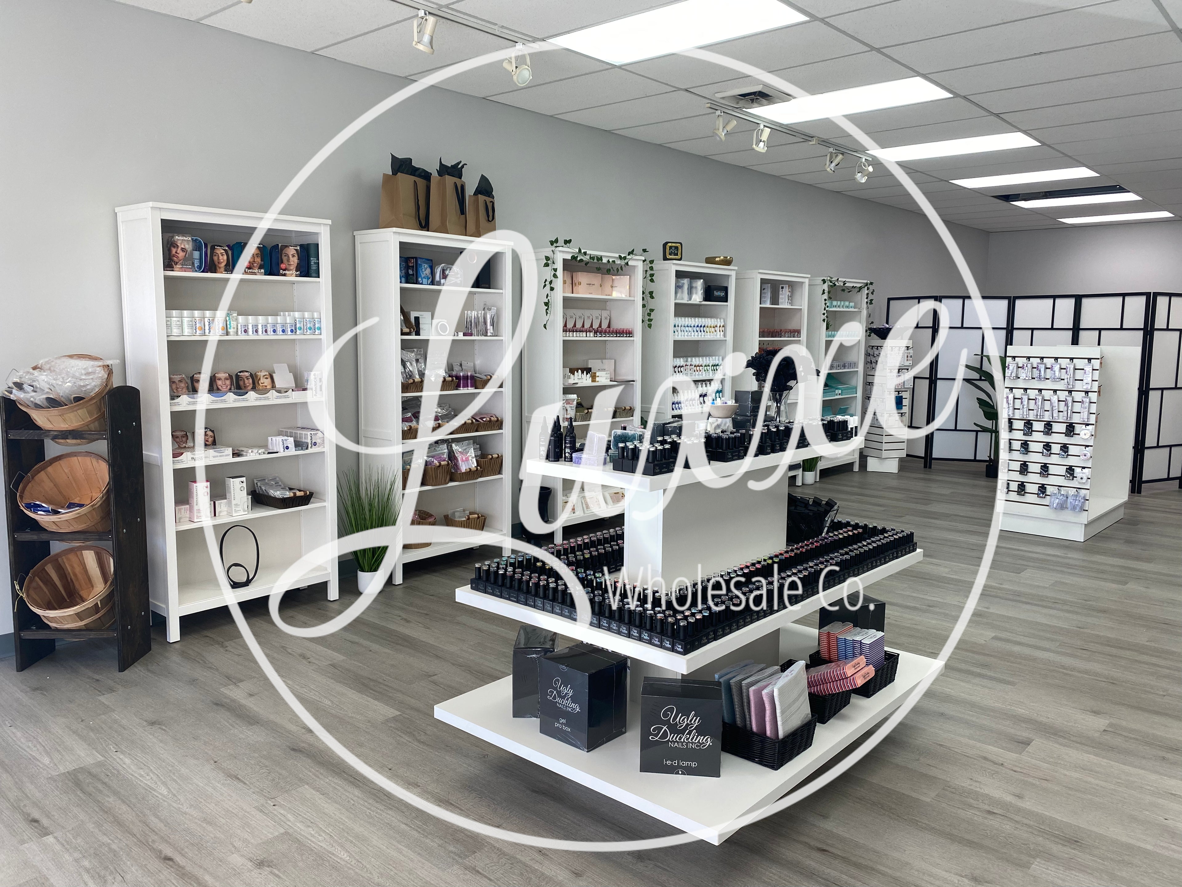 Luxxe Wholesale Co. Store with Shelves stocked with products for Nail Technicians, Estheticians, and Licensed Beauty Professionals.